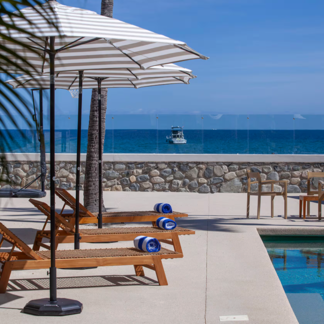 Beachfront pool and lounge chairs at the Los Barriles, Mexico retreat venue
